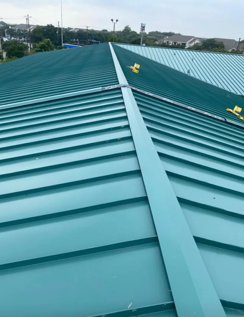 Green commercial metal roof ridge and valley for Metal Roof Repair in Fort Lupton