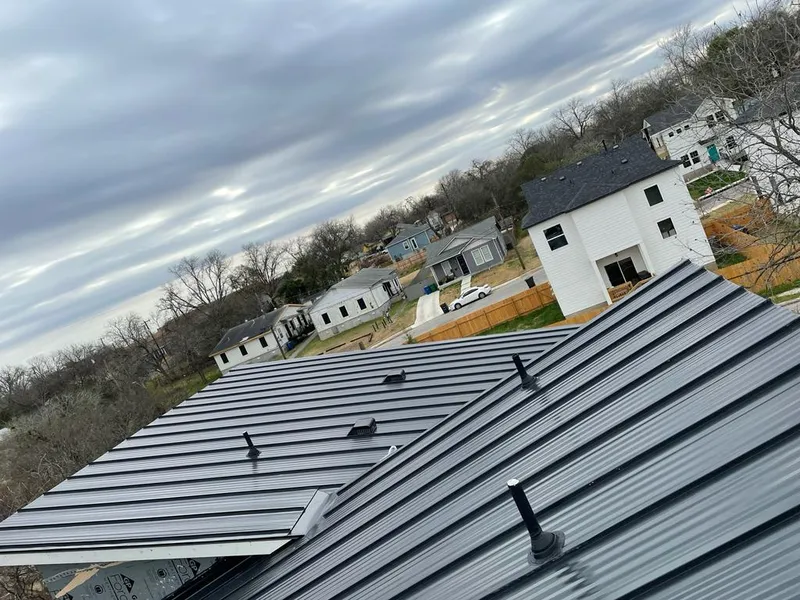 Standing seam metal roof panels with vents for Skylight Repair in Fort Lupton